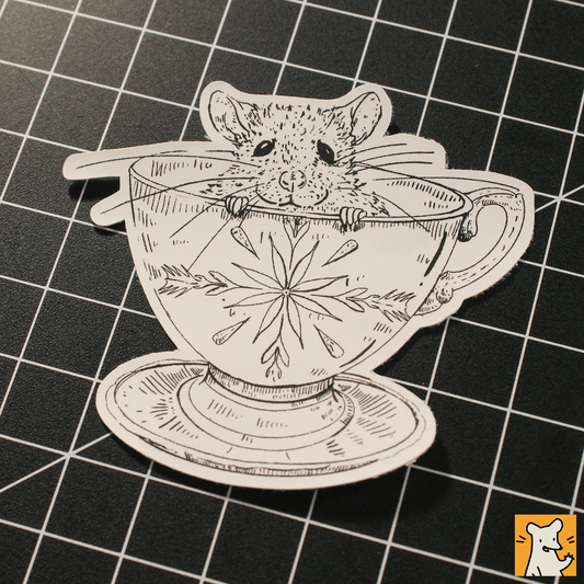 Hand-illustrated baby rat sticker peeking out of a decorative cup, ideal for laptops and craft projects.