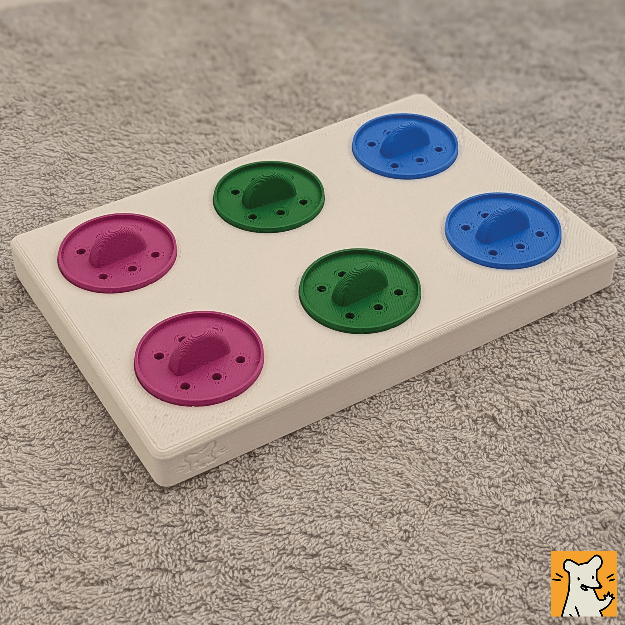 Large foraging puzzle toy with six colorful removable lids for small pets like rats and rabbits.