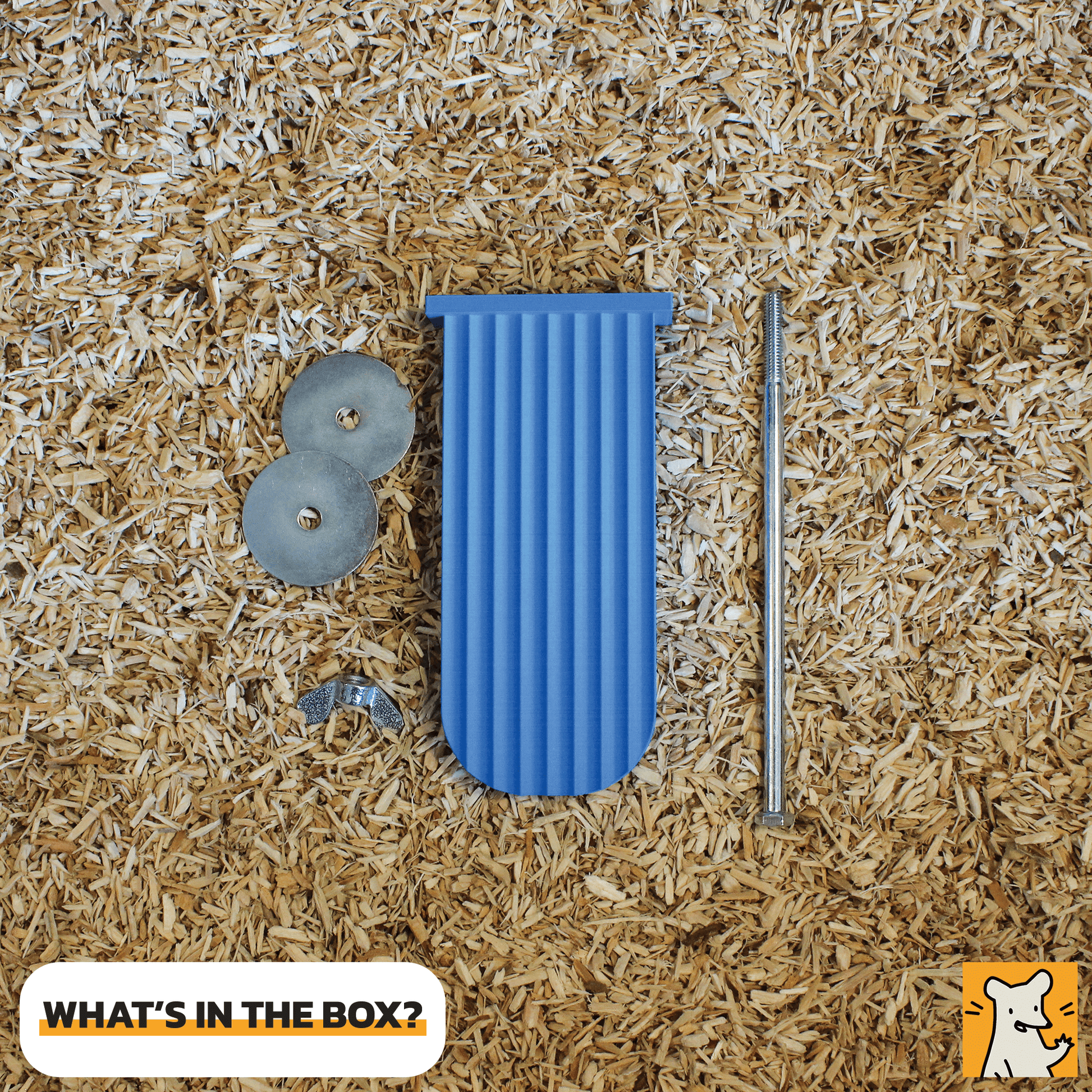 Contents of the box for a medium rat cage platform including parts and accessories on bedding material.