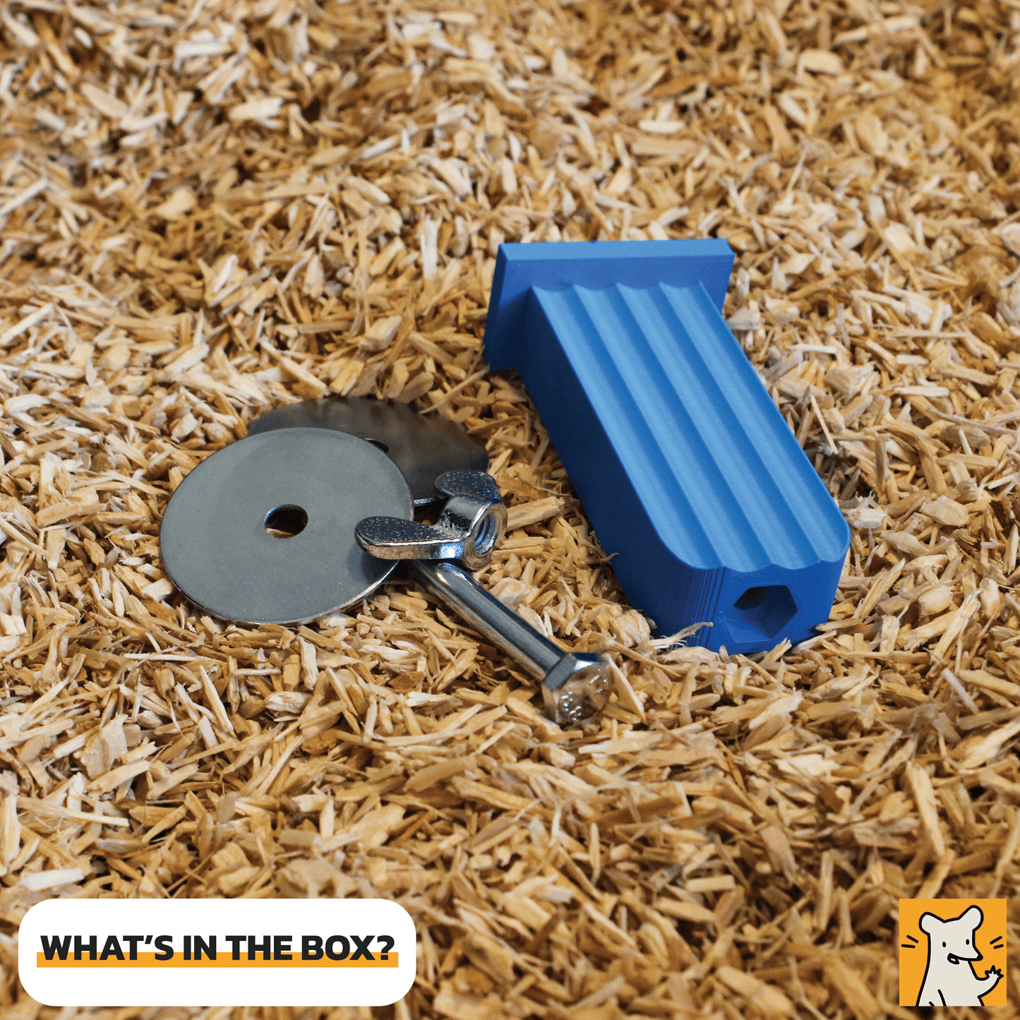 Items in the box: blue rat cage ledge, metal washers, and bolt on wood shavings.